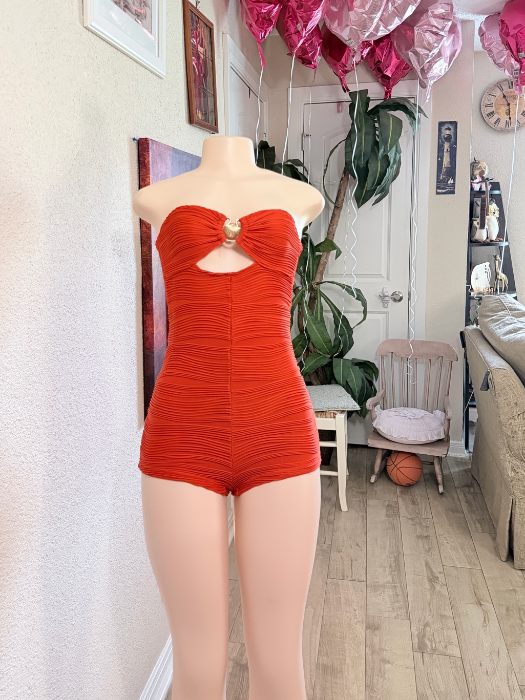 Stunning Orange Bodysuit That Radiates Summer Energy